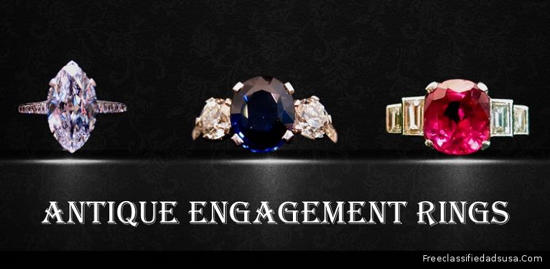 Double Snake Engagement Ring with a Diamond & Sapphire from Beverley R